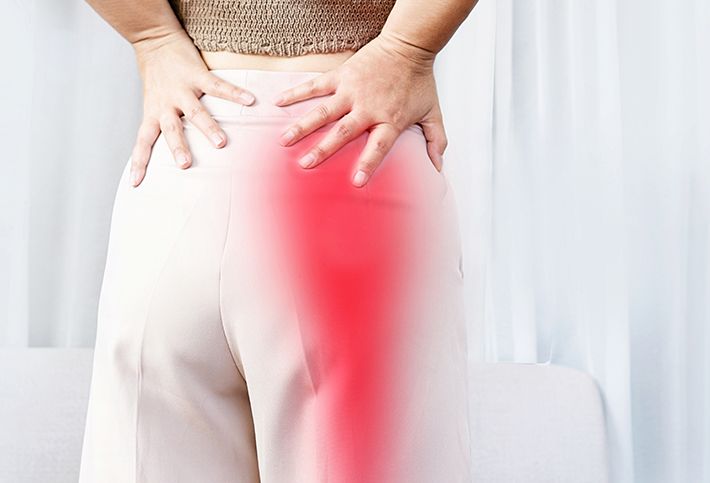 Woman suffering from sciatica